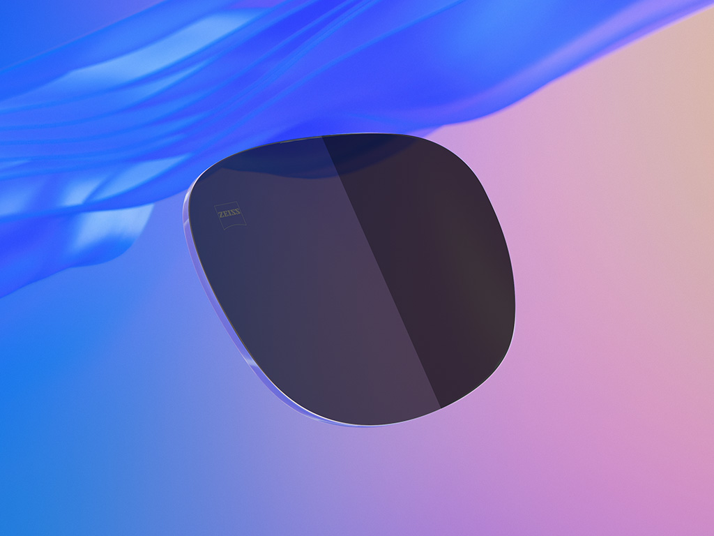 Ilustración CGI en 3D de unos lentes solares tintados, una mitad con un nivel de oscuridad más claro que la otra.