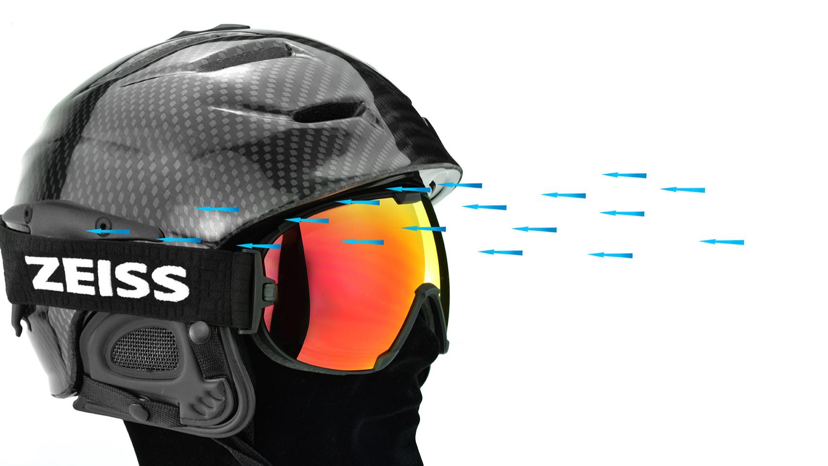 Casco negro con máscaras de nieve ZEISS rojas